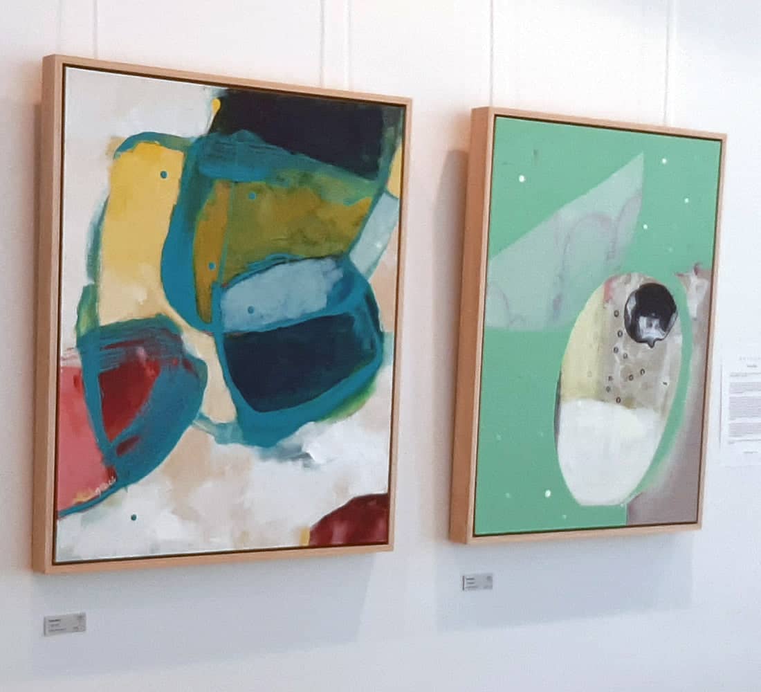 Kirsty Black abstract paintings displayed in gallery setting, colorful framed artwork