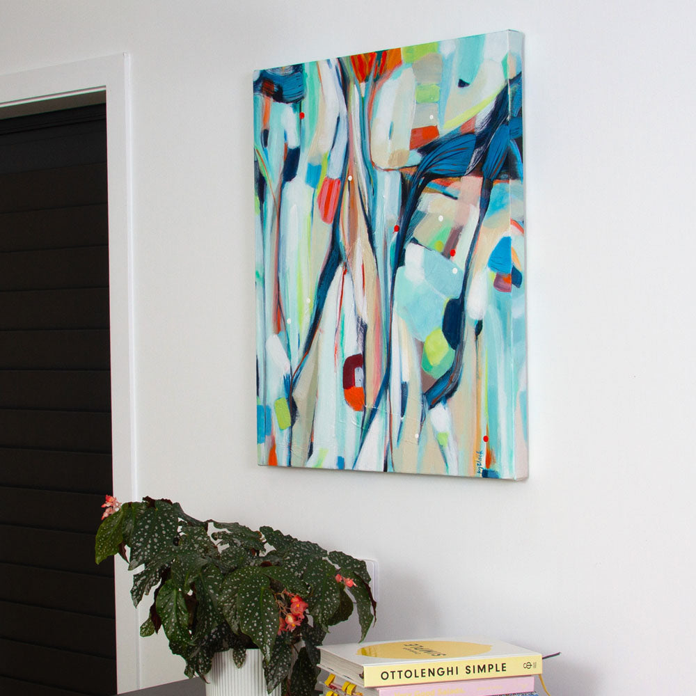 Colourful original abstract painting Bobcat Pyjama Party hanging on a white wall