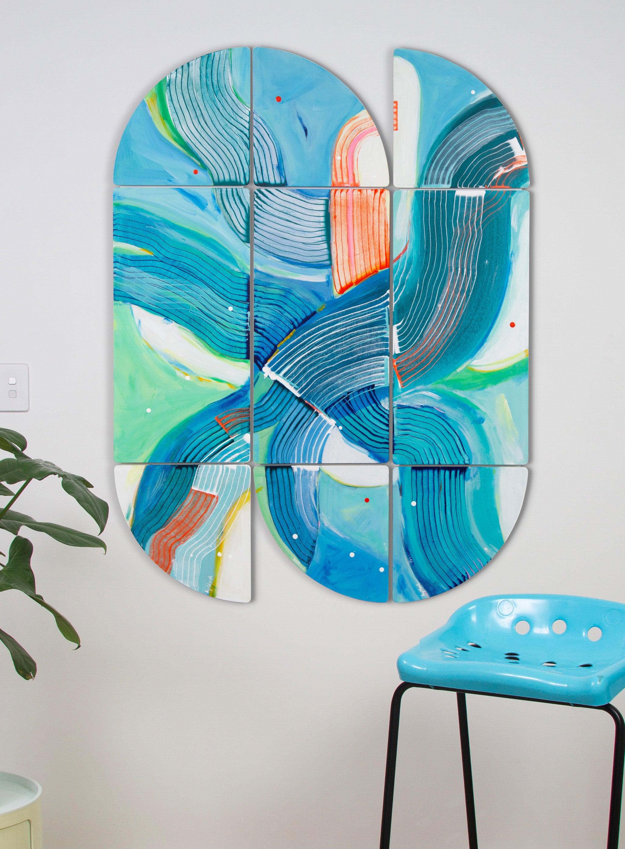 Duck Derby, rhythmic triptych abstract painting with blue, green, orange hanging on white wall