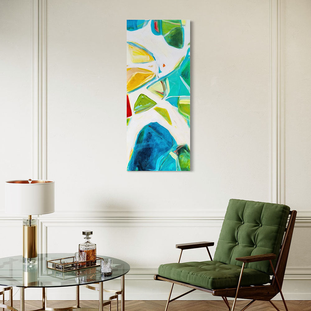 Jet Set Jaunt original abstract painting by Kirsty Black hung vertically on white panelled wall beside mid-century green upholstered chair and glass coffee table with brass lamp, showing scale of 1220x508mm tall narrow portrait canvas in elegant living space