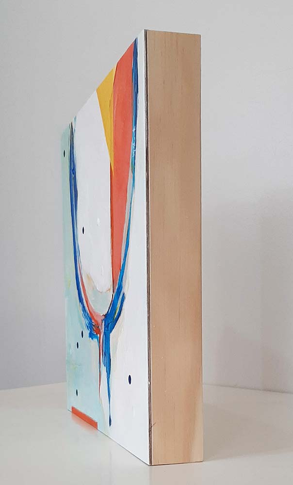 Side view of Leprechaun Condo abstract painting by Kirsty Black showing 40mm depth of ply box board with unpainted natural wood grain edges
