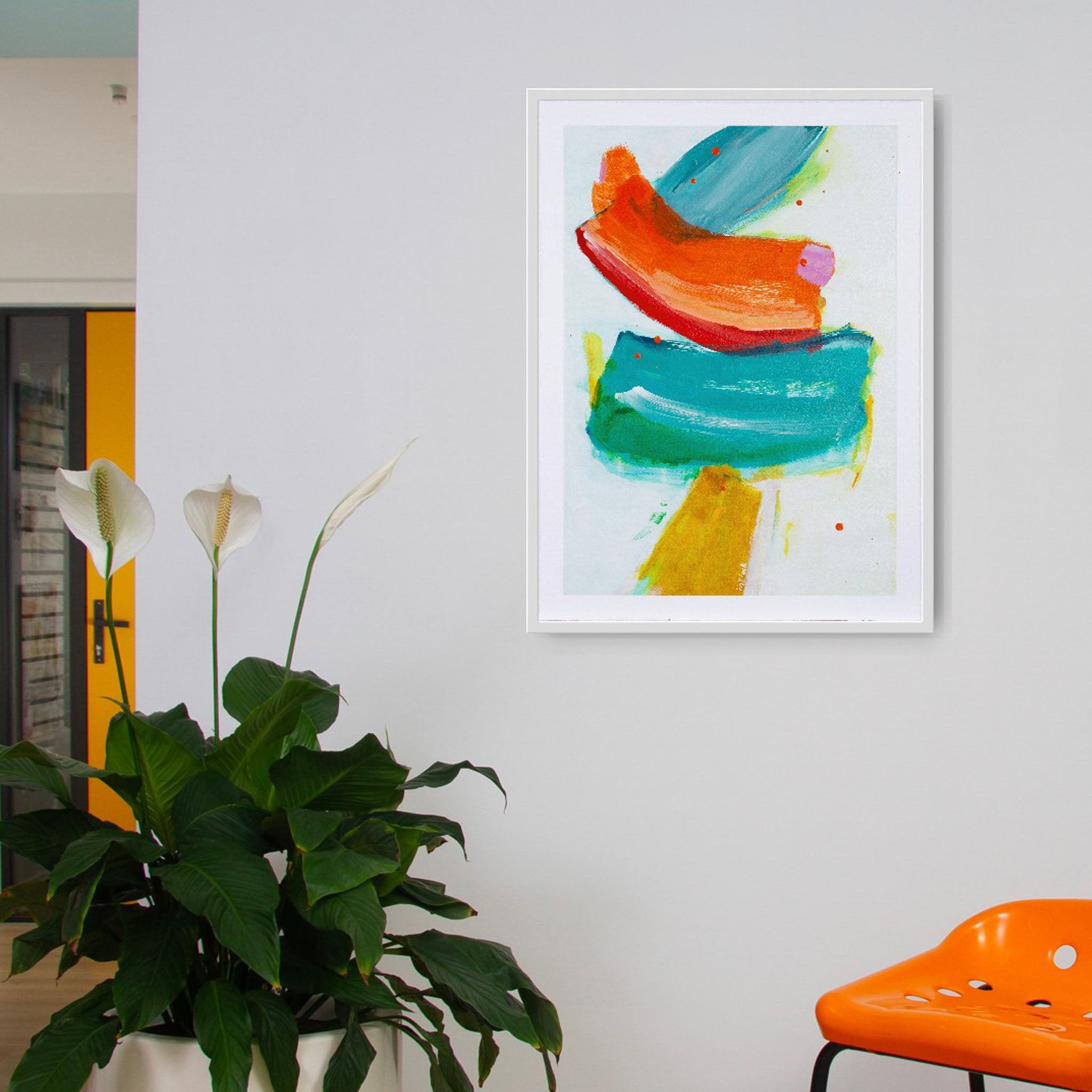 Gestural, vibrant framed abstract original painting hanging on a white wall