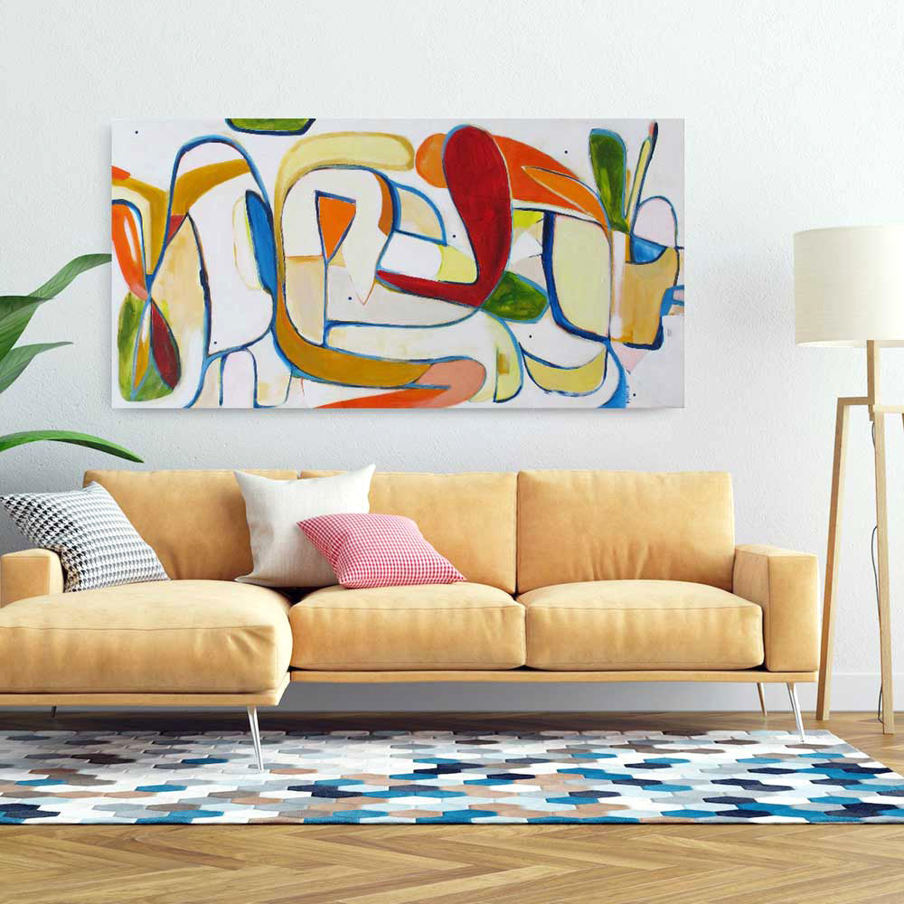 Living room with a large abstract statement painting hanging above a yellow sofa