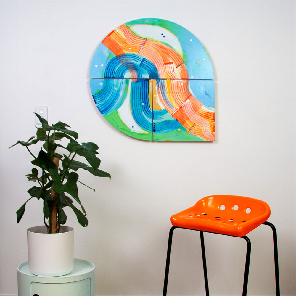 Platypus Paddle - Teardrop-shaped abstract painting hanging on white wall