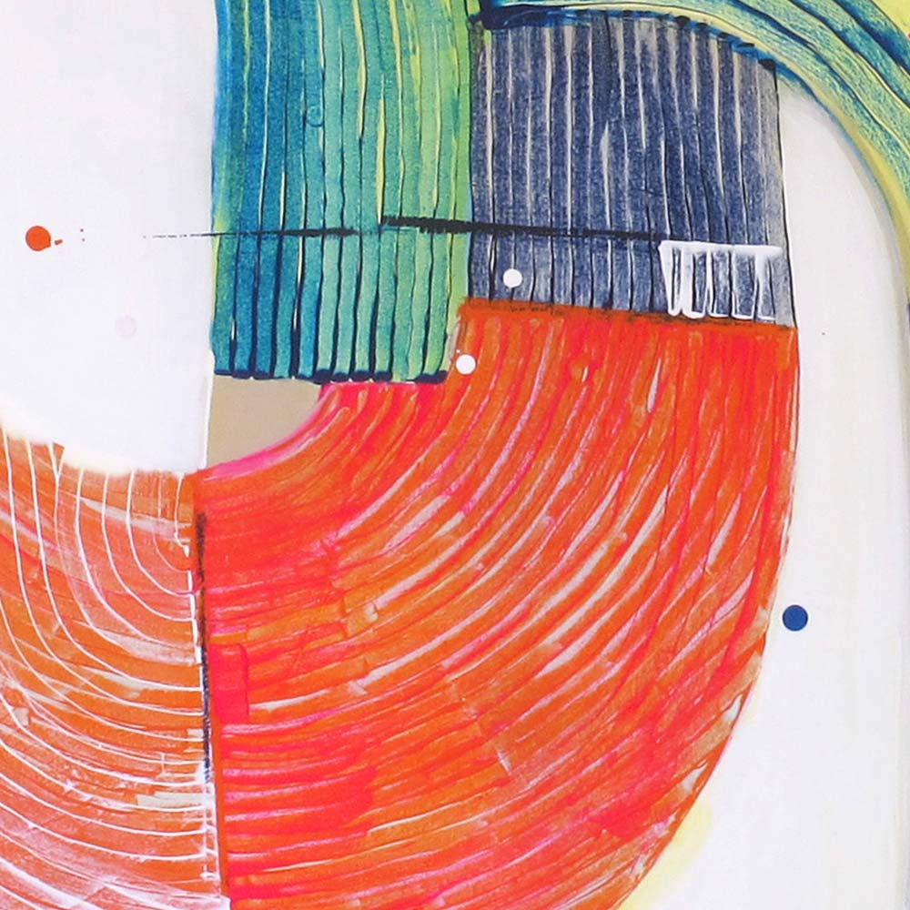 Close-up of Sandhopper Springboard showing vibrant coral orange curved section meeting navy blue striped area with white accents and scattered dots