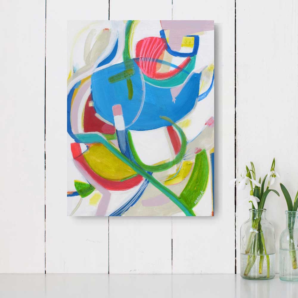 Showboat Sharlene abstract painting by Kirsty Black on white shiplap wall with glass bottles of snowdrops showing vibrant colorful composition