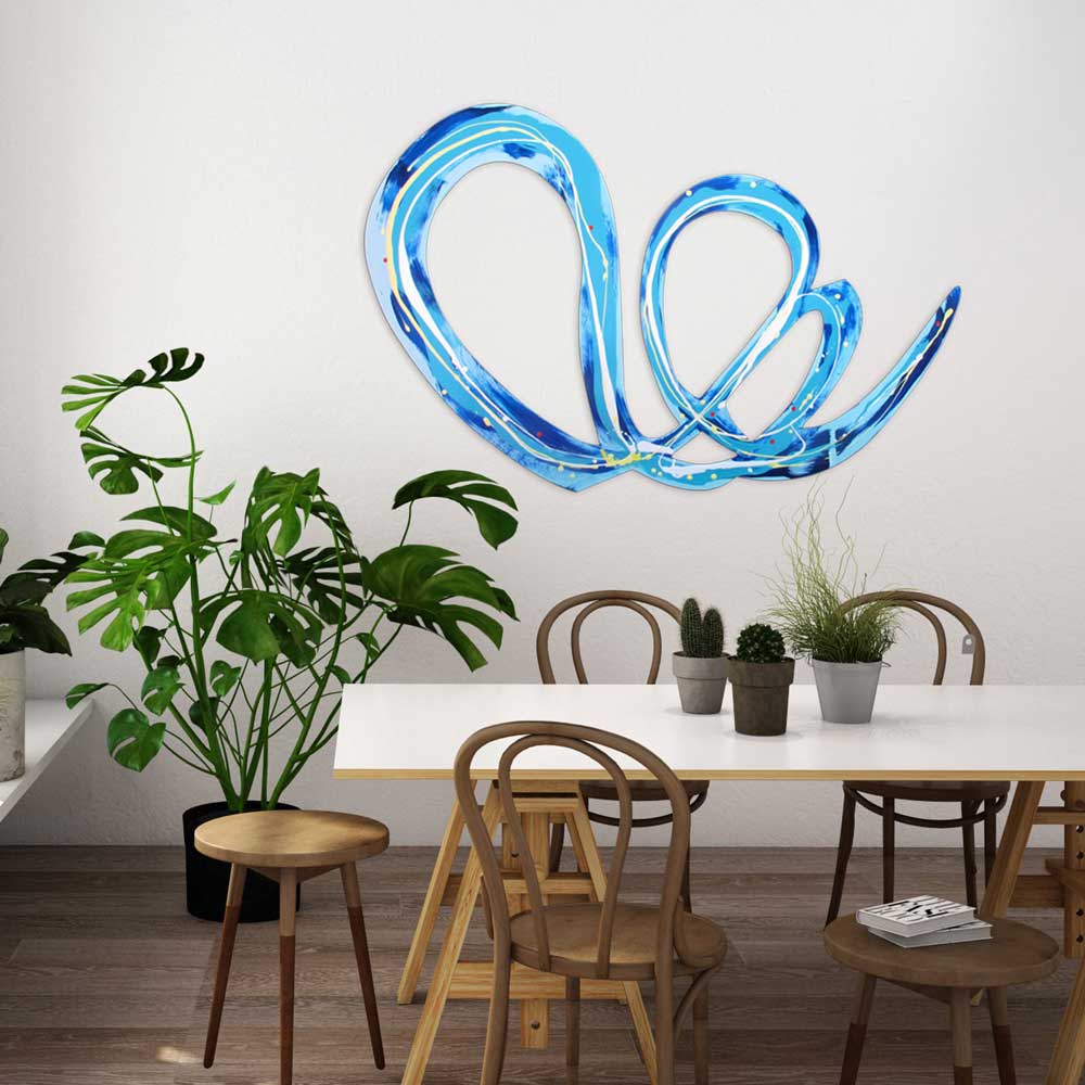 Flouncing Flora wall sculpture by Kirsty Black installed horizontally above a white dining table in a light-filled contemporary interior with bentwood chairs, cacti and a large monstera plant.