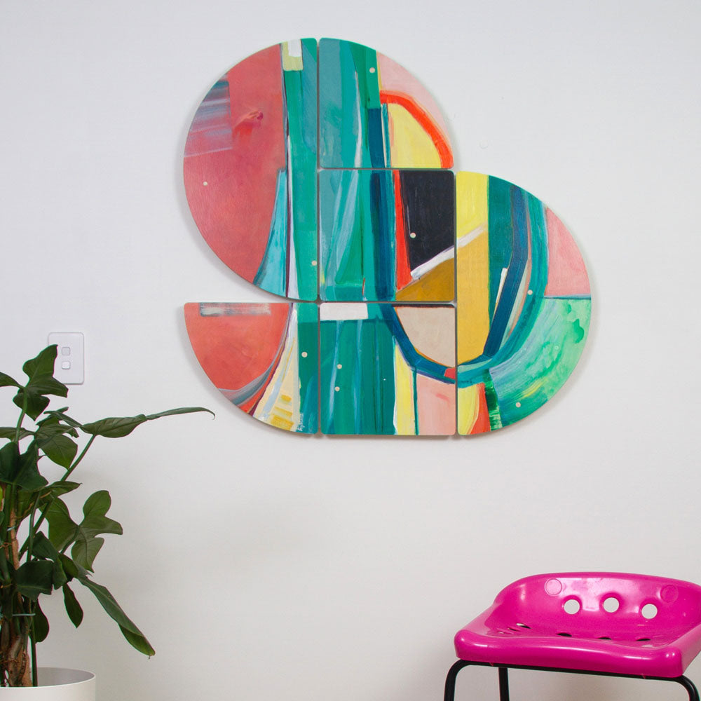 Penelope Farting, vibrant, shaped wall sculpture hanging on a wall