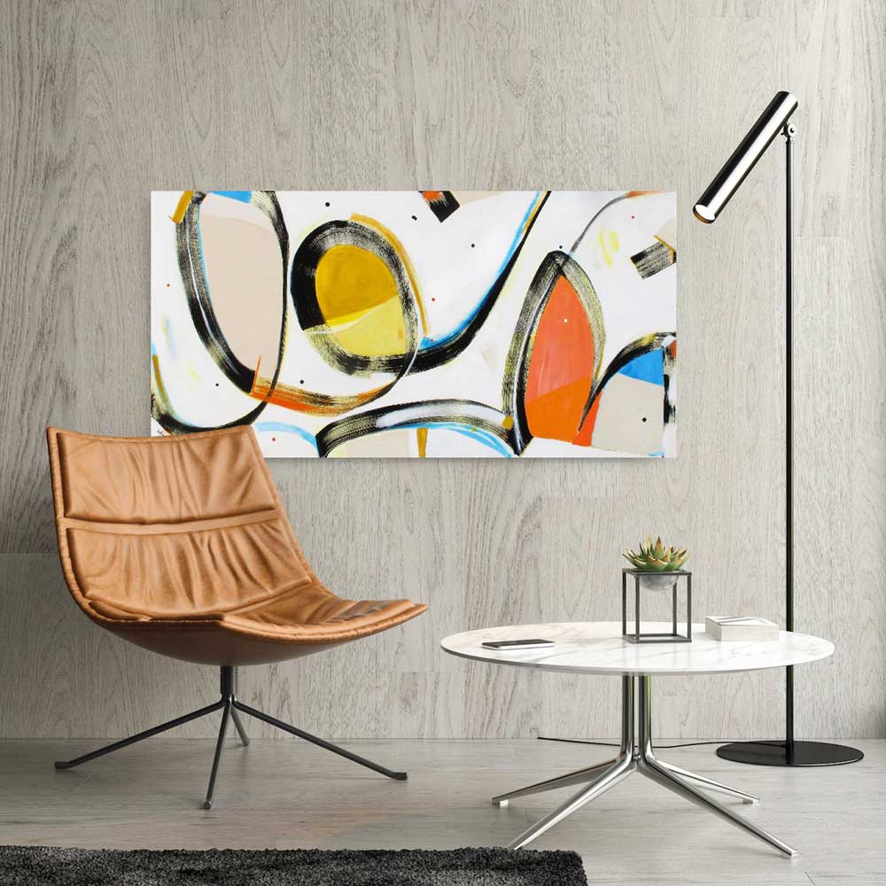 Catapult Katarina, large abstract painting on a concrete wall hanging above a leather armchair and modern coffee table