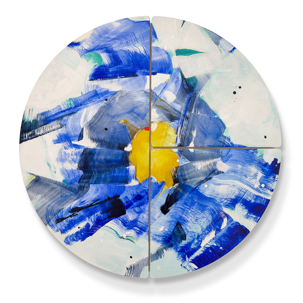 Full view of Anemone Guise original abstract wall sculpture by Kirsty Black - circular three-tile bevelled plywood with sweeping ultramarine blue brushstrokes radiating from a vivid yellow centre, against a pale aqua and white ground.