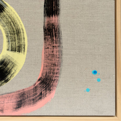 Close-up detail of Pussy Cat Prowl showing the lower pink and black sweeping arc with lime yellow curve and three vivid turquoise dots on natural linen ground in natural wood tray frame